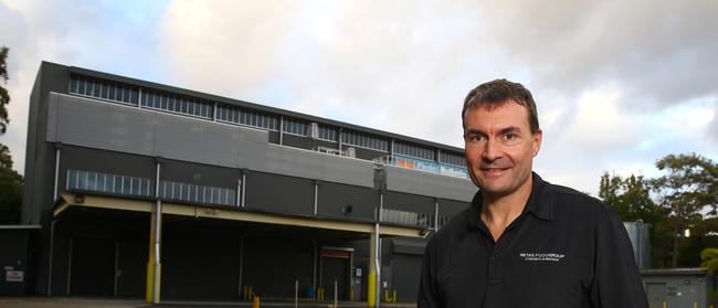 RFG had big plans for the former Gold Coast Bulletin site, but it wasn’t to last. Here former RFG managing director Andre Nell is pictured in 2016 at the site shortly after purchasing it. Photo: David Clark