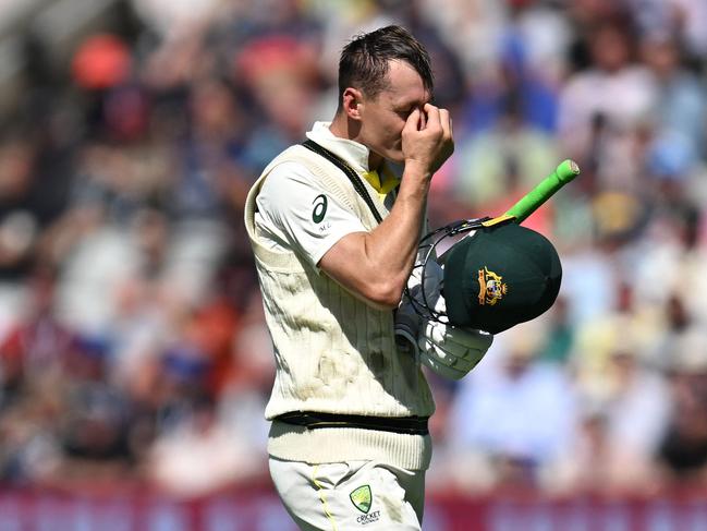 Australia's Marnus Labuschagne reacts as he walks back to the pavilion after losing his wicket for 51 runs. Picture: AFP