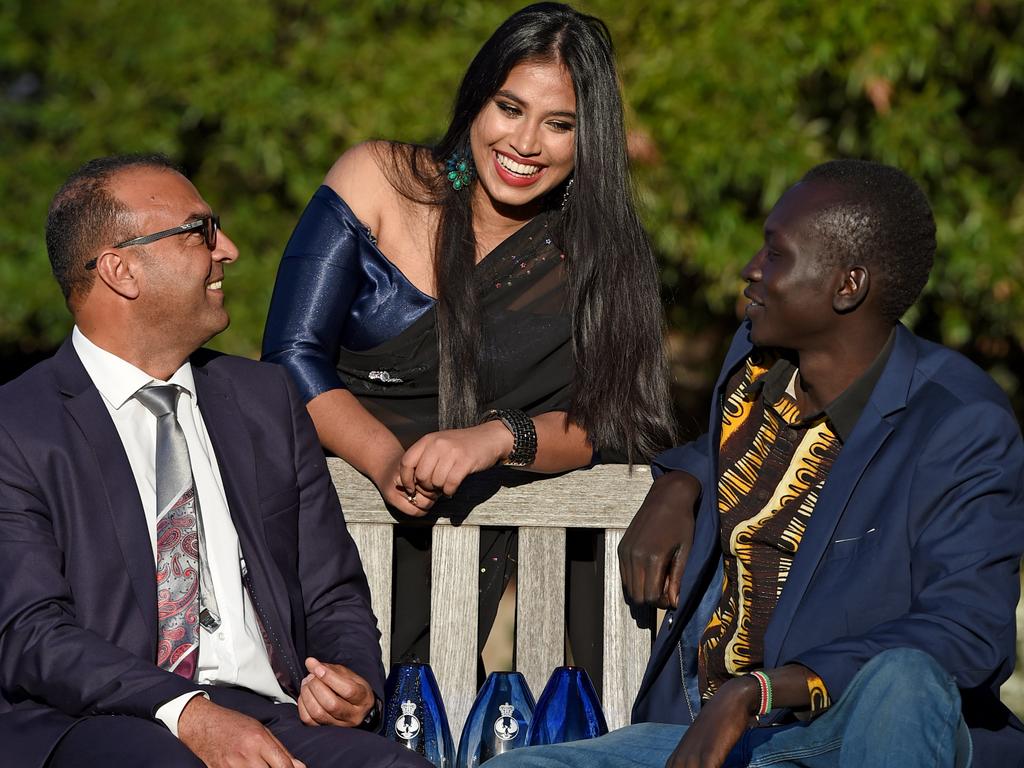 Vinuri Gange flanked by Dr Hamoudi Neshmi Aldyni and Gabriel Akon at Government House. Picture: Naomi Jellicoe