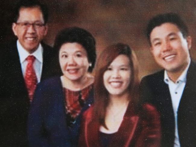 Murder victim Curtis Cheng (left) with his family. Picture: Toby Zerna