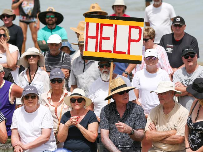 MELBOURNE, AUSTRALIA - JANUARY 5 2025Beach goers and locals attend a rally at Inverloch Surf Life Saving Club where sand is rapidly eroding from the beach (they've apparently lost about 70m of beach already). The state government was supposed to release a report late last year determining their plans for the beach, but held it (expected to drop in January now). the government is seriously considering letting the surf beach and the facility just be washed away instead of intervening. Picture: Brendan Beckett