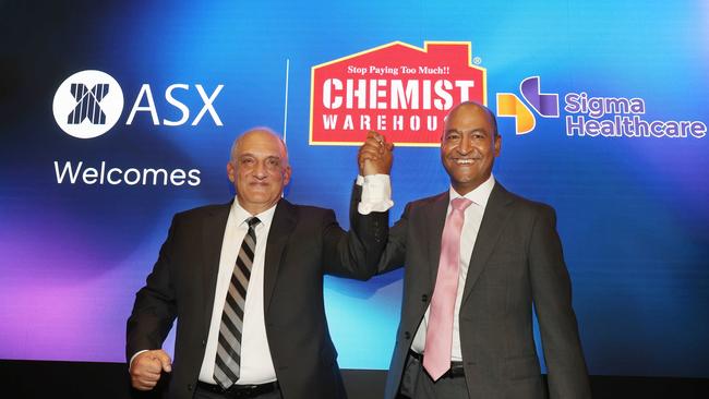 Mario Verrocchi, one of the founders of Chemist Warehouse and current chief executive Vikesh Ramsunder, at the ASX for the formal listing of the new merged entity made up of Sigma Health Care and Chemist Warehouse. John Feder/The Australian.