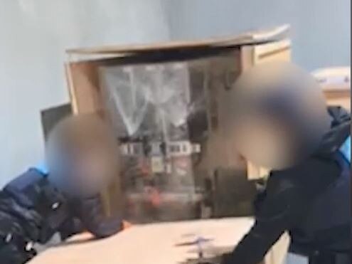 The AFP has arrested an alleged high-priority organised crime target and a Victorian-based syndicate in connection to the importation of 160kg of cocaine into Melbourne, worth an estimated $40 million dollars., vision of members unpacking a consignment crate and images of the cocaine seized for operation ironside.