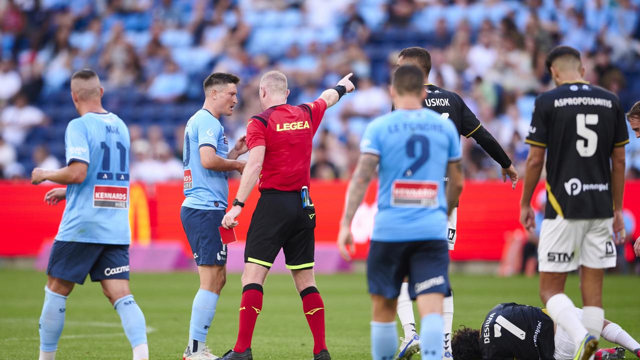 Sydney FC’s Joe Lolley (second from left) is sent off for his tackle on Macarthur FC’s Danny De Silva. Picture: Brett Hemmings/Getty Images