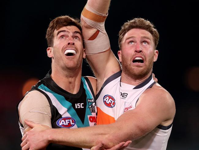 ADELAIDE, AUSTRALIA - JULY 27: Dawson Simpson of the Giants competes with Scott Lycett of the Power during the 2019 AFL round 19 match between the Port Adelaide Power and the GWS Giants at Adelaide Oval on July 27, 2019 in Adelaide, Australia. (Photo by James Elsby/AFL Photos via Getty Images)