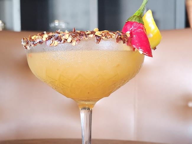 One of the new signature cocktails on their menu is the Mango Jalapeno Margarita.