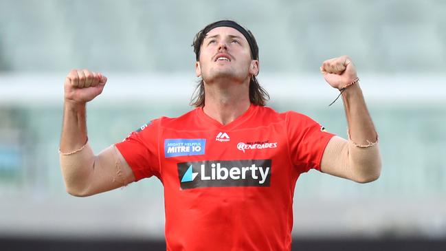 MELBOURNE, AUSTRALIA - JANUARY 26: Zak Evans of the Renegades celebrates after dismissing Nathan Ellis of the Hurricanes during the Big Bash League match between the Melbourne Renegades and Hobart Hurricanes at Melbourne Cricket Ground, on January 26, 2021, in Melbourne, Australia. (Photo by Mike Owen/Getty Images)