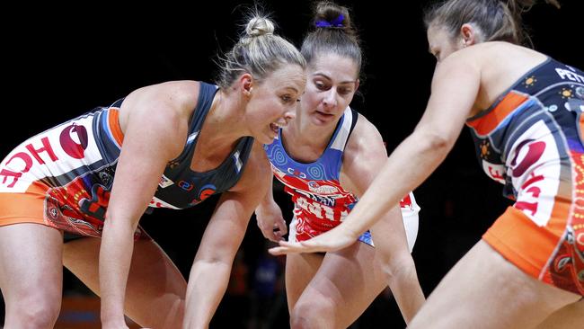 Giants and Swifts players challenge for the ball. Abbey McCulloch, centre, is out injured this season