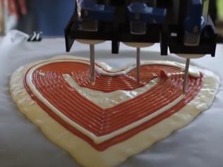BeeHex - 3D printer for pizza. People sample the 3D printed pizza.
