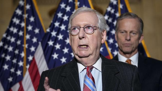 Senate minority leader Mitch McConnell speaks to reporters.