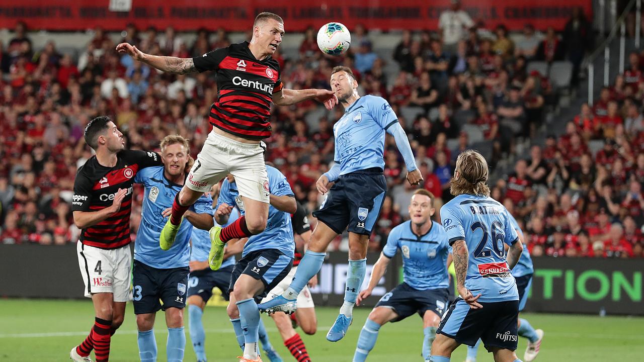 SYDNEY, AUSTRALIA - OCTOBER 26: Mitchell Duke of the Wanderers competes for a header during the round three A-League match between the Western Sydney Wanderers and Sydney FC at Bankwest Stadium on October 26, 2019 in Sydney, Australia. (Photo by Mark Metcalfe/Getty Images)