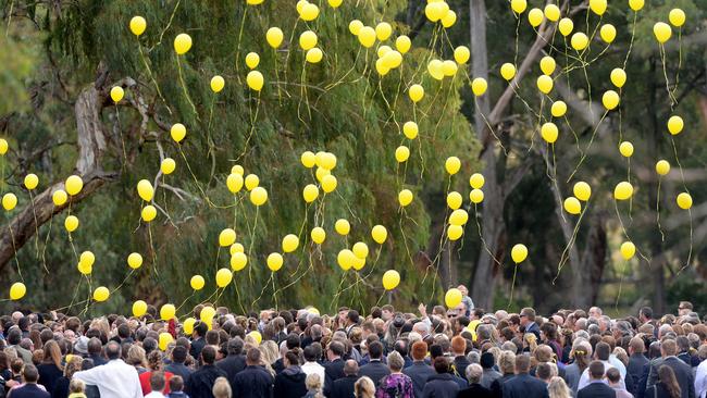 Hundreds of locals turned out for the funeral service of murdered schoolteacher Stephanie Scott in Eugowra, releasing balloons in her favourite colour. Picture: Jeremy Piper