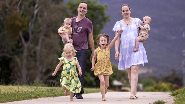 Sara Knight and Trent Furnari, aged 36 and 46, moved to Wodonga from Melbourne in 2018 to raise a family in Tangambalanga, near Albury. Sara and Trent with their kids Annabelle, 3, Elva, 5, and twins Sebastian and Patrick, 11 months. Picture: Alex Coppel