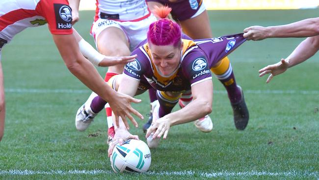 Chelsea Baker scores a try for the Broncos against the Dragons at Suncorp Stadium. Picture: