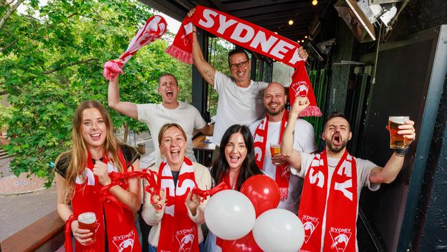 Swans fans Charlotte Bradford, Nick Cerrone, Catriona Piper, Raf Magalhaes, Deanna Pserras, Daniel Noble, and Bradley Calvin. Picture: Justin Lloyd