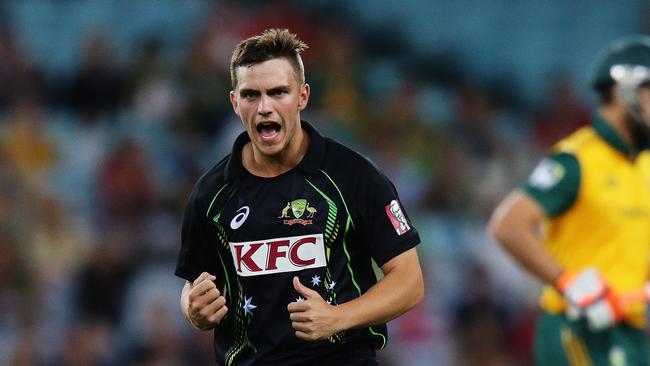 Australia's Cameron Boyce celebrates after taking the wicket of South Africa's Rilee Rossouw caught by Australia's Sean Abbott during the Australia v South Africa T20 International cricket match at ANZ Stadium, Sydney. Pic Brett Costello