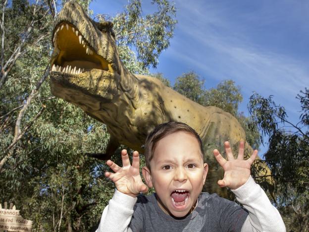 Xavier Soccio in front of Tyrannosaurus rex at "Zoorassic" at Werribee Zoo.