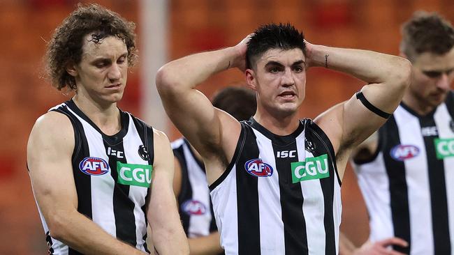 Dejected Pies Chris Mayne and Brayden Maynard had moments late in the clash with GWS they’d rather forget. Picture: Phil Hillyard