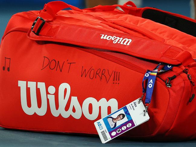 A message on Alex de Minaur’s bag. Picture: Michael Klein