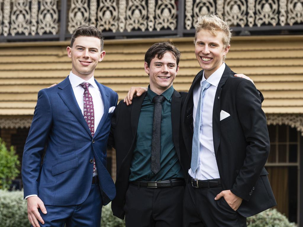 Graduates (from left) Thomas Pikramenos, Oliver Rutherfoord and Declan Campbell as Downlands College year 12 students come together for their valedictory mass at the college, Saturday, November 16, 2024. Picture: Kevin Farmer