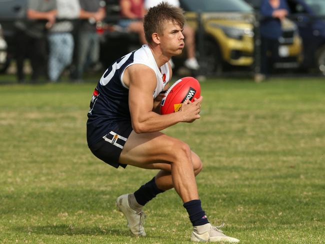 Ballarat FL footy: Melton South v Bacchus Marsh: William Thornton-Gielen of Melton South marksSaturday, May 1, 2021, in Melton, Victoria, Australia. Picture: Hamish Blair