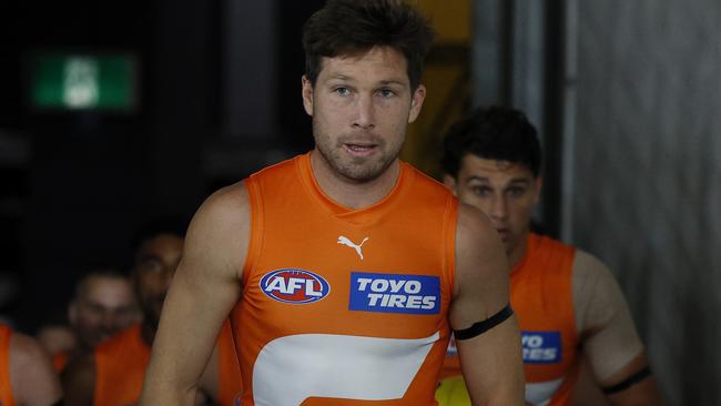 MELBOURNE , AUSTRALIA. April 20 , 2024.  AFL Round 6.  Carlton vs GWS Giants at Marvel Stadium.  Toby Greene leads the Giants onto Marvel Stadium    . Pic: Michael Klein