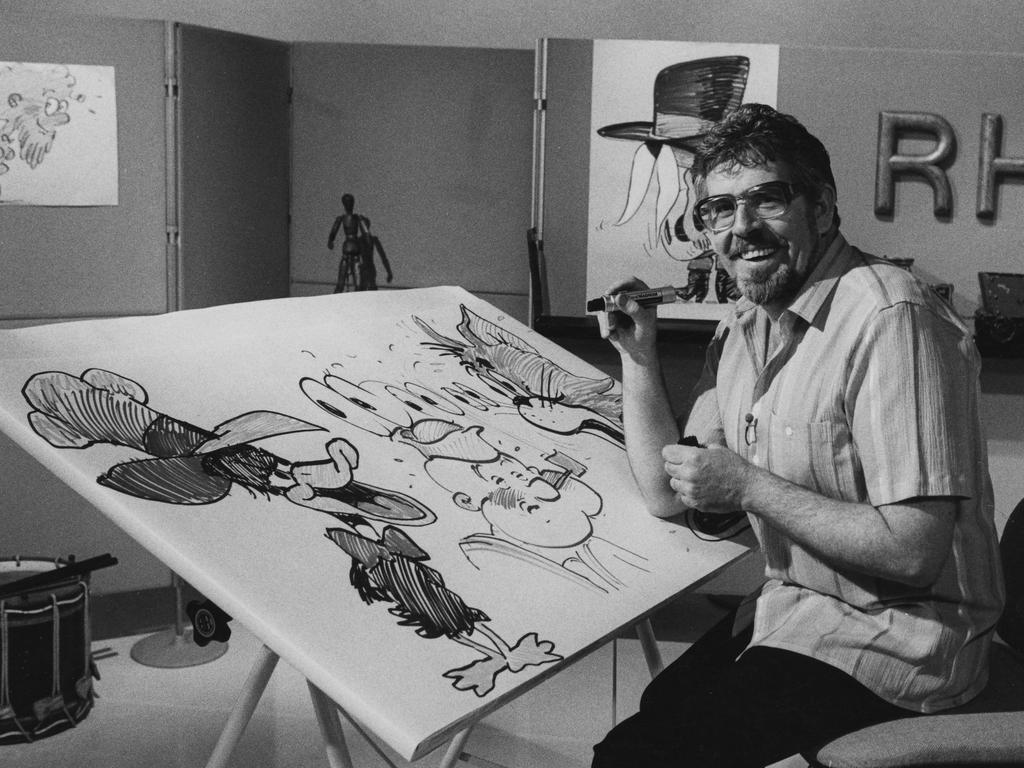 Rolf Harris drawing caricatures. Picture: Getty Images