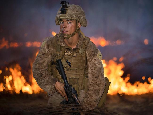 A US Marine trains at Mount Bundey in the Northern Territory during Exercise Talisman Saber  ... a $22 million contract to upgrade range facilities at four key NT Defence training areas has been awarded