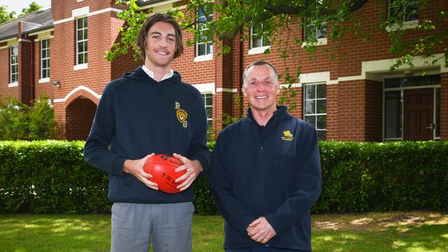 Ballarat Grammar director of sport Dean Rossato with Year 12 student boarder Floyd Burmeister.