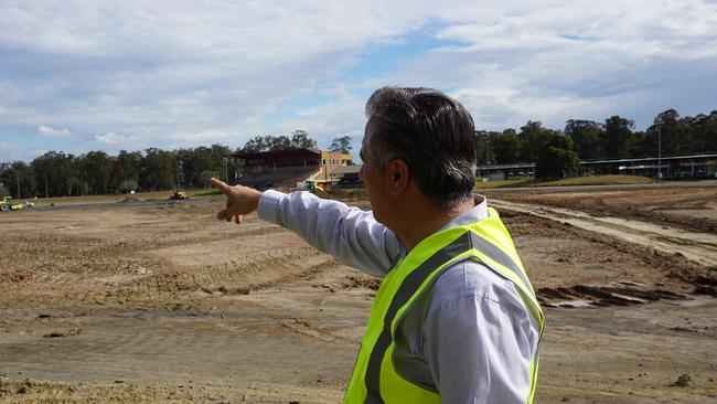 Fairfiled City Mayor Frank Carbone at the Showground development, pointing to where the new grandstand could be built.