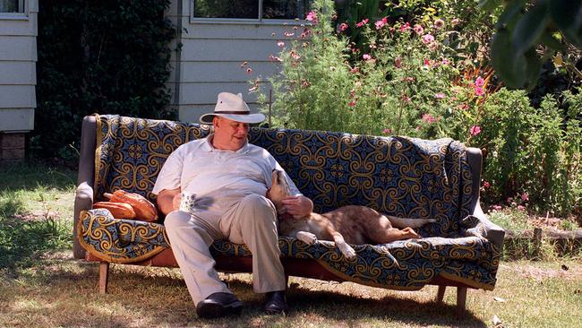 Murray relaxes with his dog at home, after winning the TS Elliot Prize for outstanding poetry in 1997.  