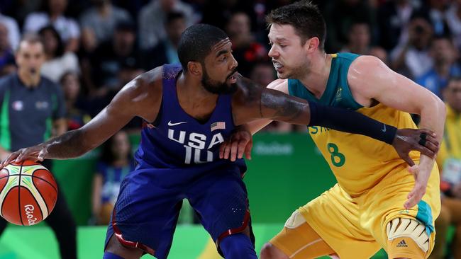 Kyrie Irving and Matthew Dellavedova in action during the Rio Olympics 2016 Men's Basketball game between the Australian Boomers and the USA Dream Team at Carioca Arena. Pics adam Head