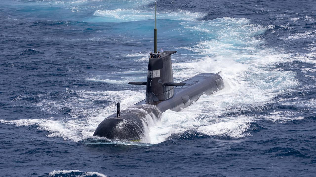 Australia, the US and UK have announced a new strategic defence partnership - known as AUKUS - to build a class of nuclear-propelled submarines and work together in the Indo-Pacific region. The new submarines will replace the Royal Australian Navy's existing Collins submarine fleet. Picture: ADF/Getty