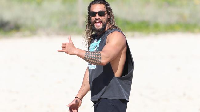 The students say Jason Momoa, who has been getting out and about on the Gold Coast while filming Aquaman, is a great father figure. Picture: NIGEL HALLETT