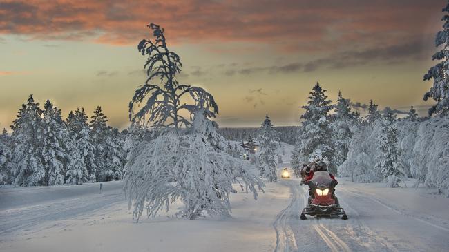 On a snow mobile excursion in Lapland.