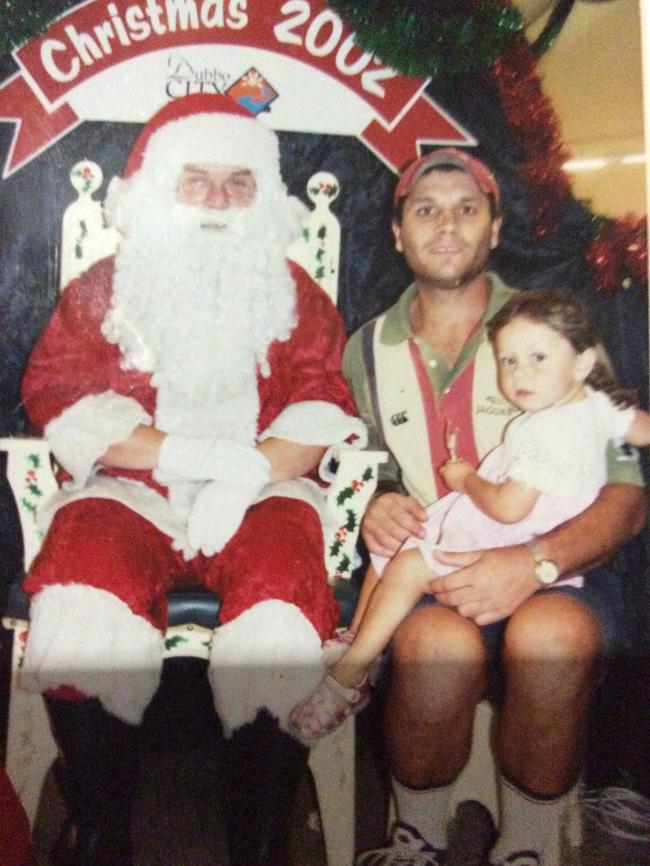 Wellington murder victim with one of his grandchildren.