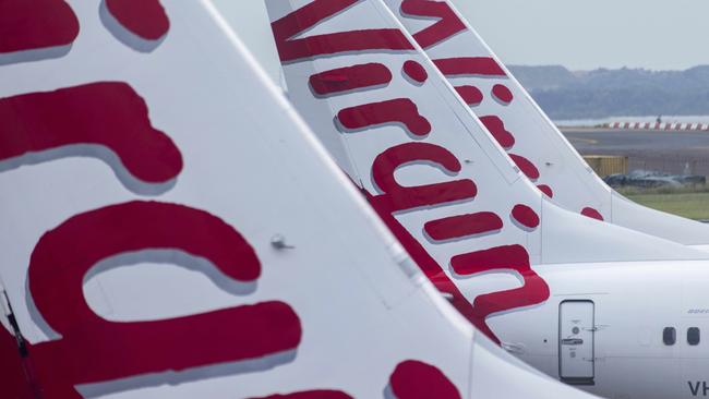 Virgin Australia tails at Sydney Airport. Picture: NCA NewsWire/Jenny Evans