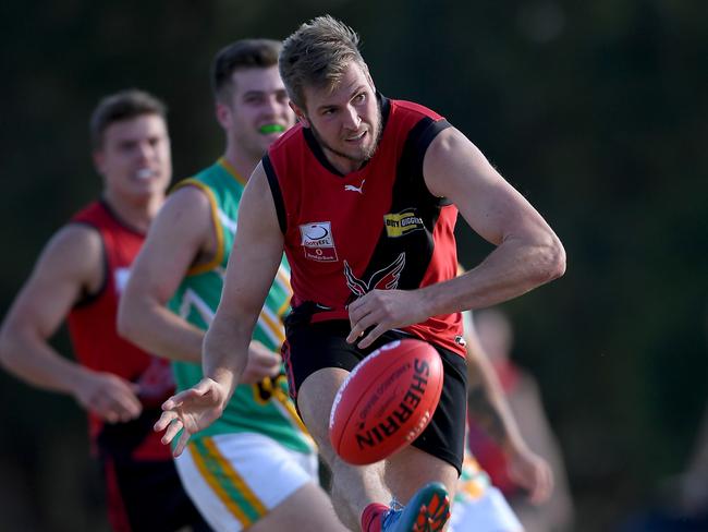 Rob Maibaum gets boot to ball for Knox. Picture: Andy Brownbill