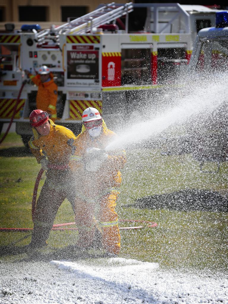 Firefighters operate the new foam system.