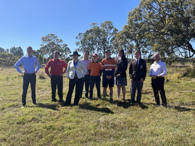 Premier Annastacia Palaszczuk with Maryborough MP Bruce Saunders, Transport Minister Mark Bailey, Hervey Bay MP Adrian Tantari and Fraser Coast Mayor George Seymour turn the sod at the site of the new $239 million Torbanlea train factory with the help of students from Maryborough State High School.