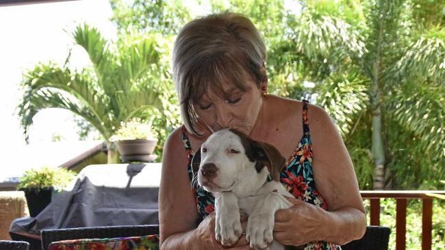 LUCKY PUPPY: Judy Whicker with foster puppy Evie. Picture: Greg Bray