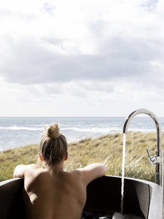 A bath with a view at Kittawa Lodge on King Island. Properties with beautiful baths are high on the wishlists of discerning travellers. Picture: Supplied