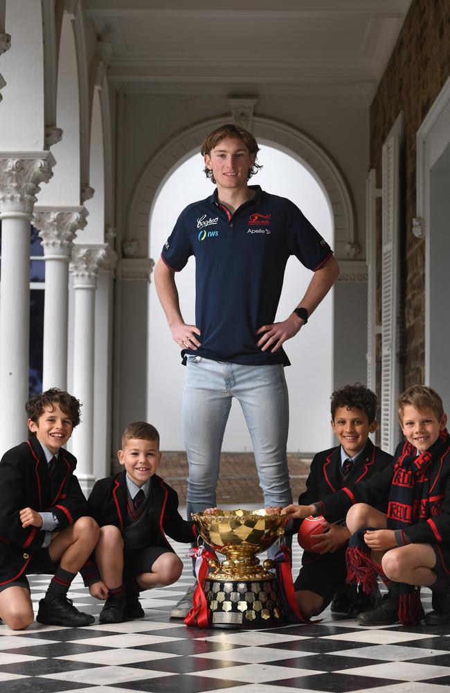 Max Michalanney with Rostrevor College students (from left) Sid 11, William 7, Sebastien 10, Thomas 9. Picture: Tricia Watkinson