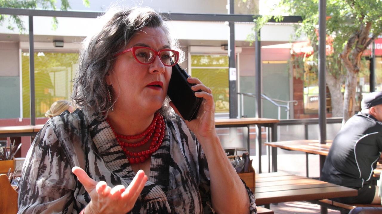 Alice Springs business owner Barbara Clifford on the phone. Picture: Gera Kazakov