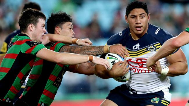 Cowboy's Jason Taumalolo attempts to bust the tackle of Rabbitoh's Issac Luke during the round 6 NRL game between the South Sydney Rabbitohs and the North Queensland Cowboys at ANZ Stadium.Picture Gregg Porteous