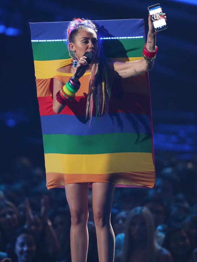 Miley appears as the rainbow Facebook profile tile.