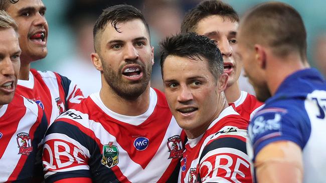 James Tedesco and Cooper Cronk celebrate a Roosters try.