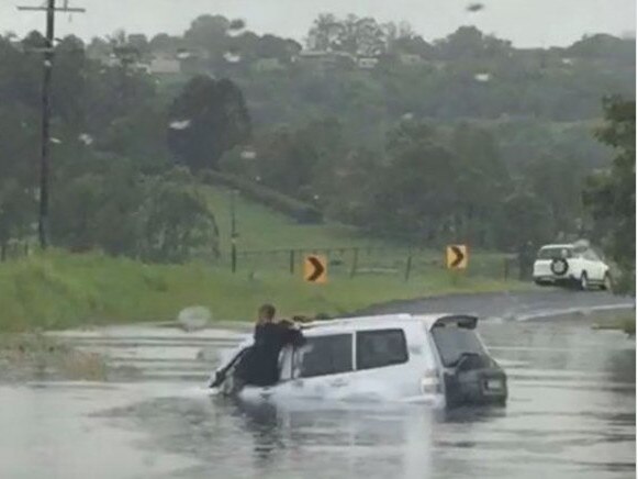 SOCIAL MEDIA IMAGE DISCUSS USE WITH YOUR EDITOR - FLOOD RESCUE: A driver and her niece were rescue after their car drove along a flooded road at Boat Harbour near Lismore. Emergency services are imploring drivers to avoid driving through water.