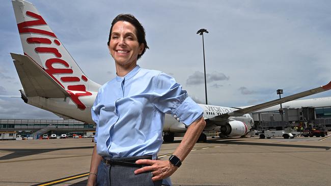 Virgin CEO Jayne Hrdlicka, on a windy day with a Virgin aircraft airside at Brisbane Airport on her first day as CEO at Virgin Australia, Brisbane Domestic Airport. Picture: Lyndon Mechielsen