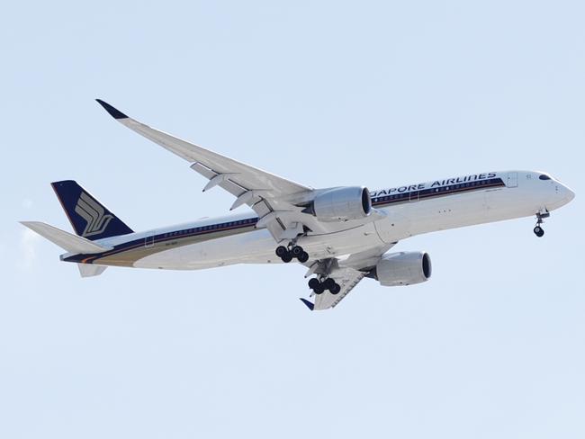 A Singapore Airlines jet aeroplane carrying cargo comes into land at the Cairns International Airport in Far North Queensland. Picture: Brendan Radke